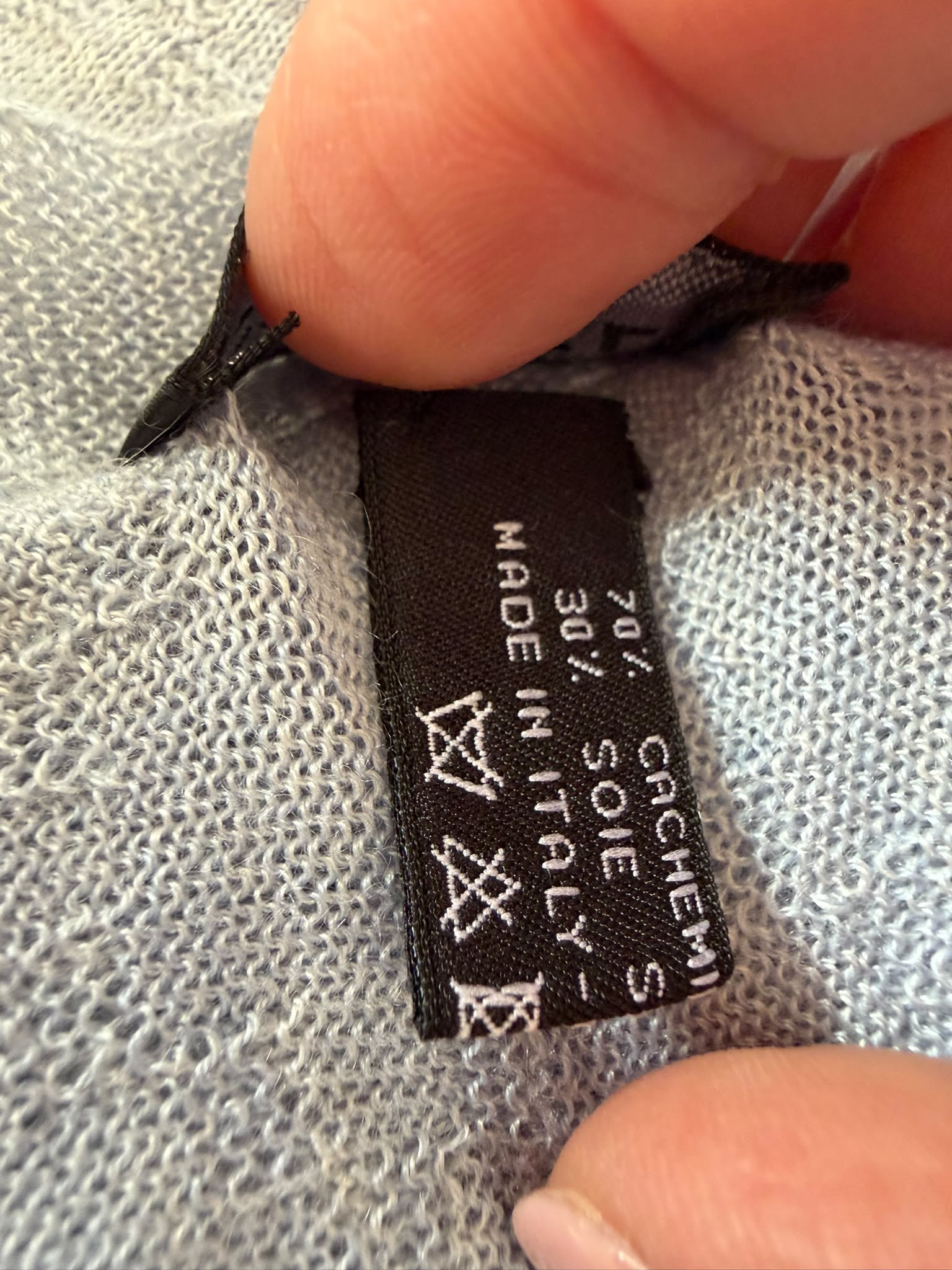 Authentic pre owned Chanel light blue scarf with pink CC logo