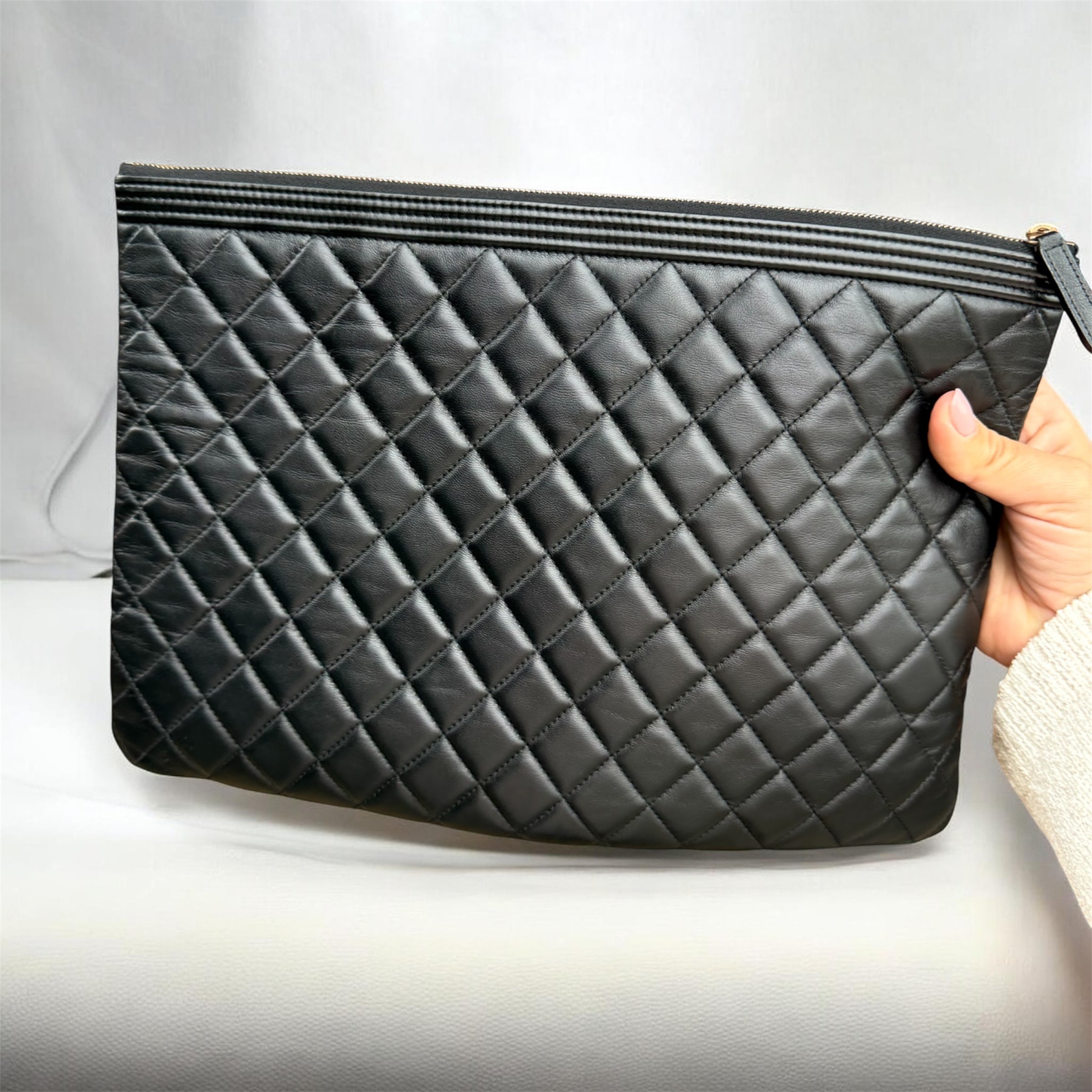 Authentic pre owned Chanel boy pouch clutch bag