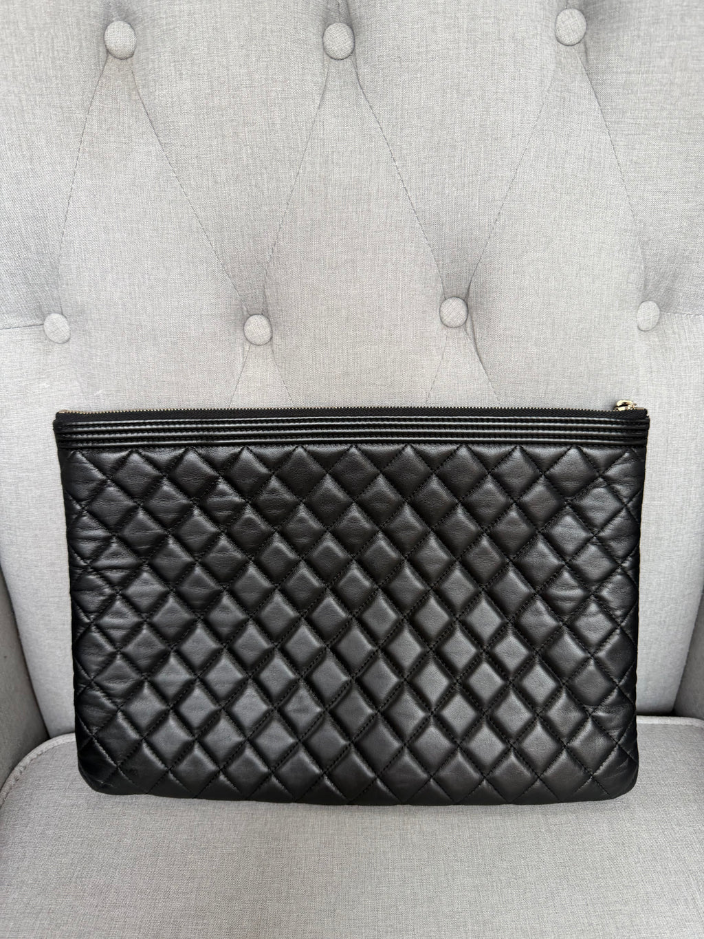 Authentic pre owned Chanel boy pouch clutch bag