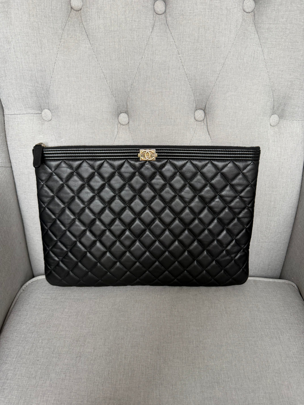 Authentic pre owned Chanel boy pouch clutch bag