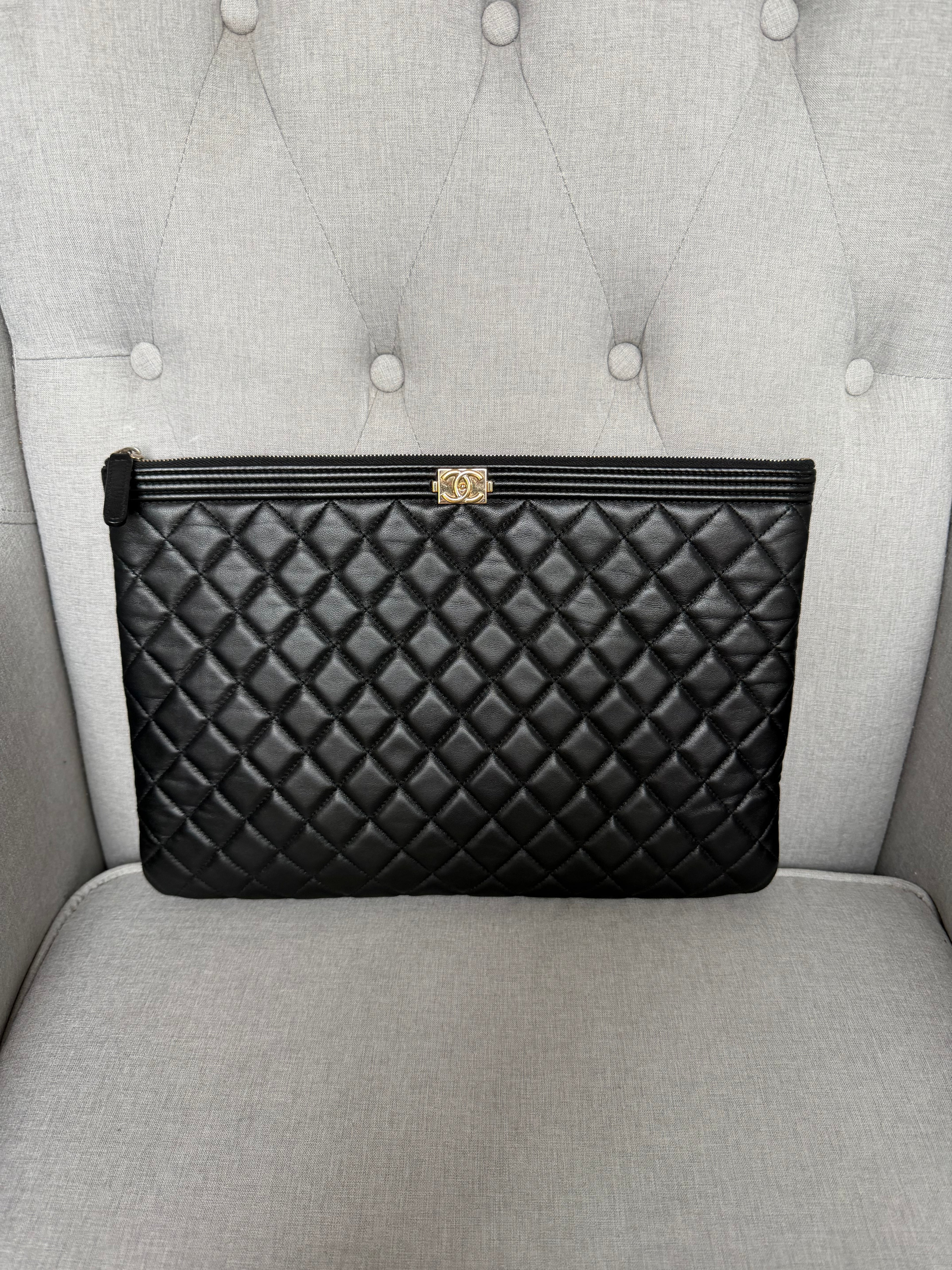 Authentic pre owned Chanel boy pouch clutch bag