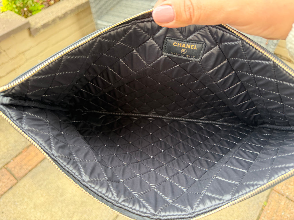 Authentic pre owned Chanel boy pouch clutch bag