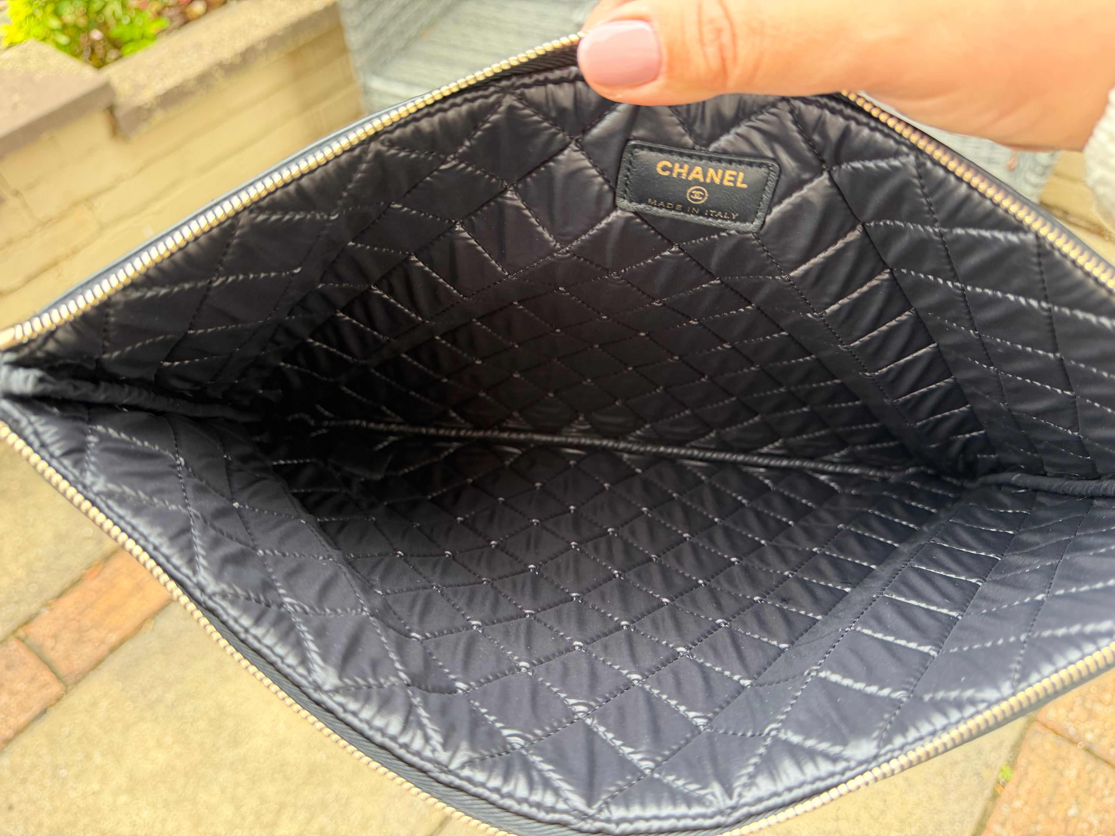 Authentic pre owned Chanel boy pouch clutch bag