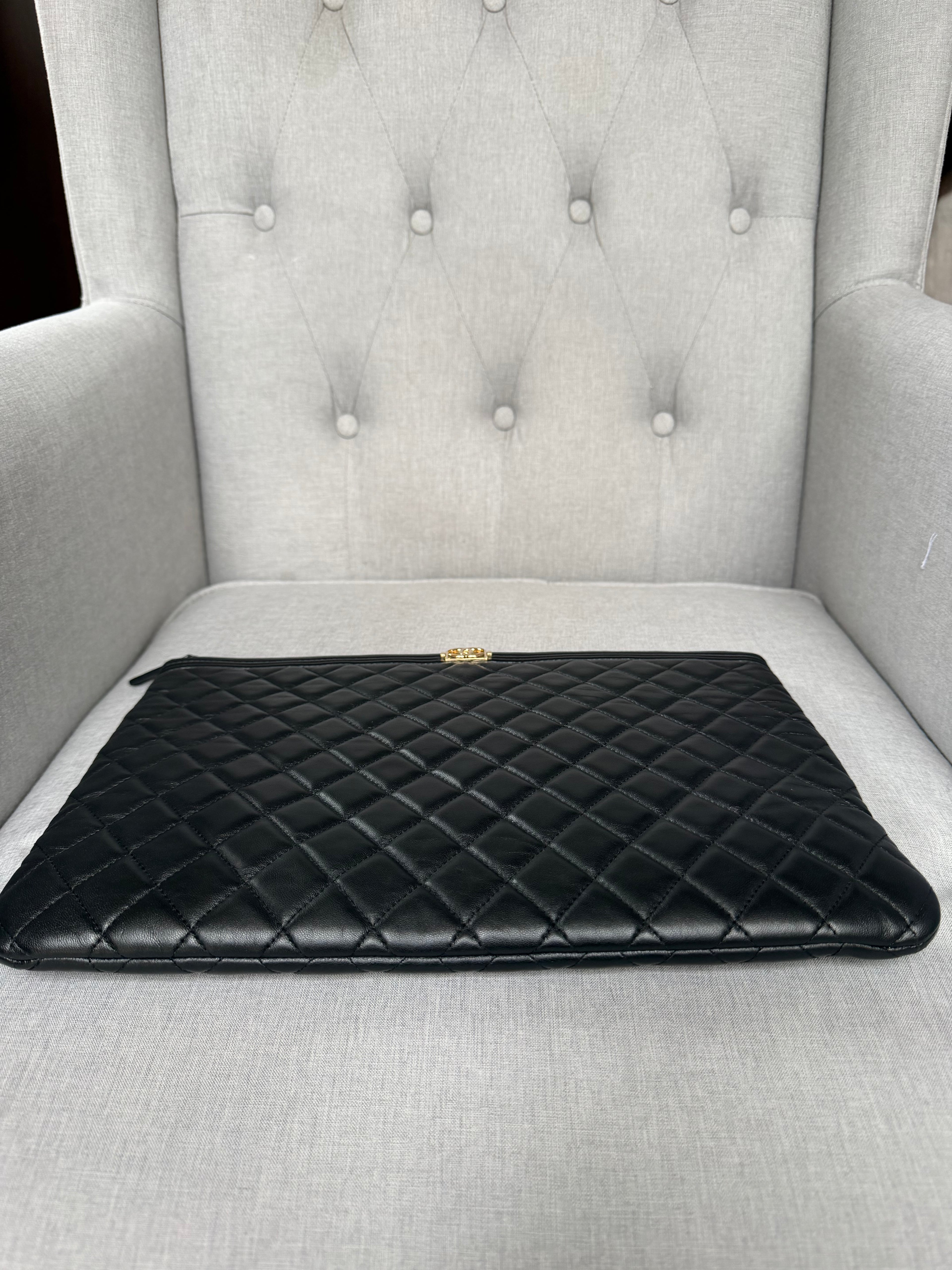 Authentic pre owned Chanel boy pouch clutch bag