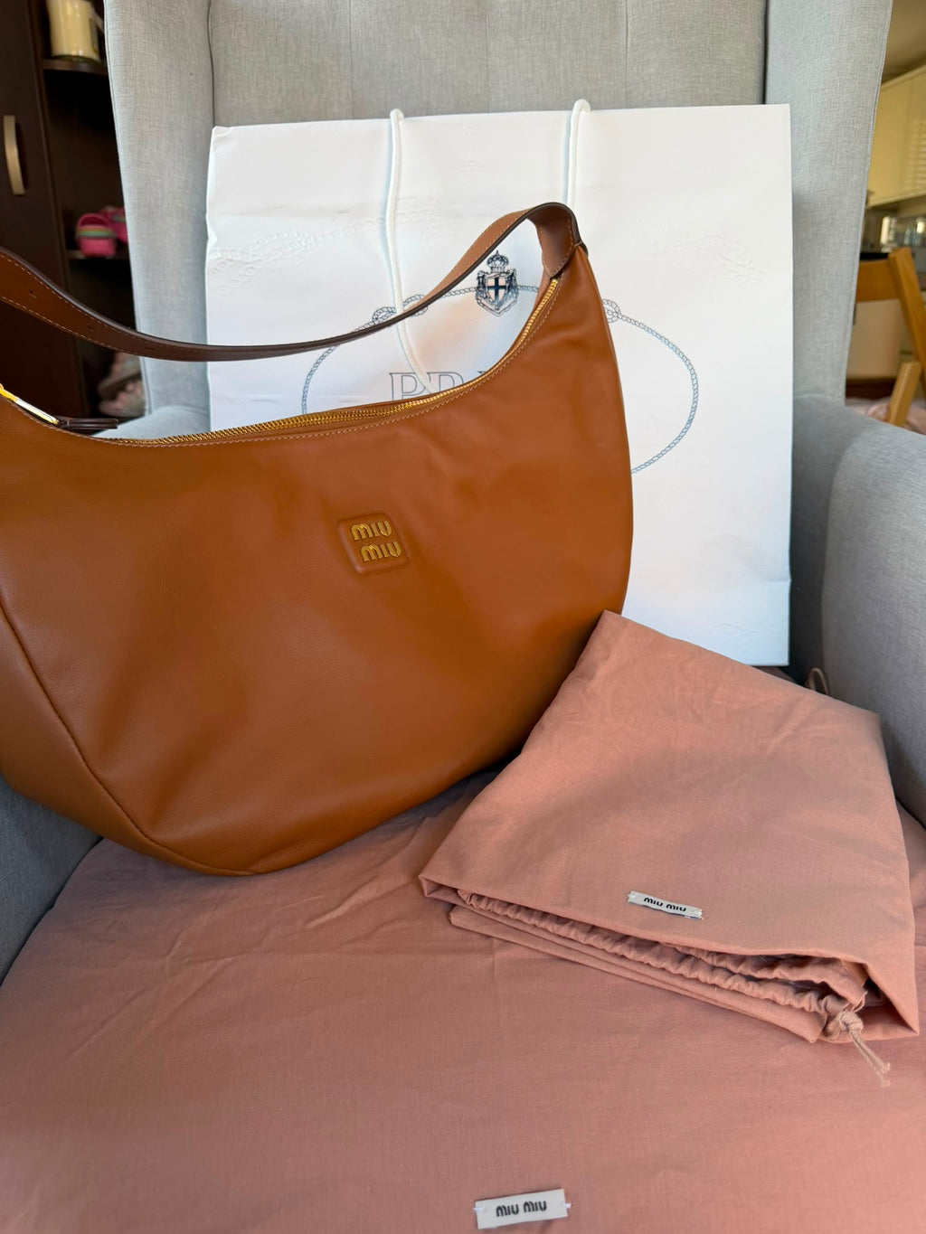 Miu Miu
Logo Plaque Shoulder Bag
