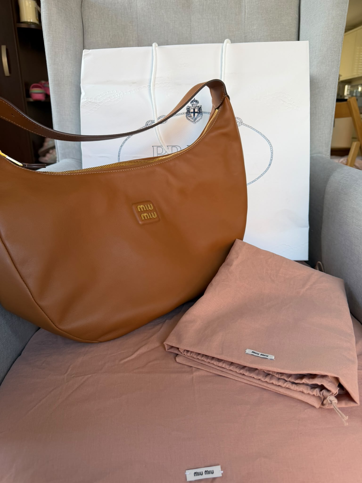 Miu Miu
Logo Plaque Shoulder Bag