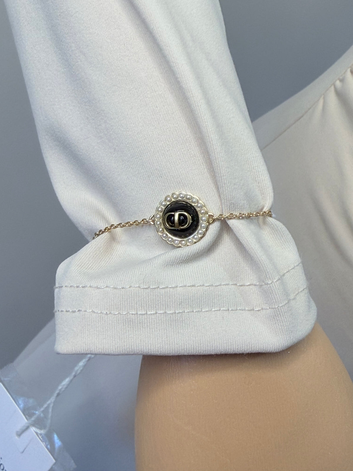 Christian Dior CD Medallion Bracelet – Gold-Tone with Black & Pearl-Effect Detail – Brand New with Tags