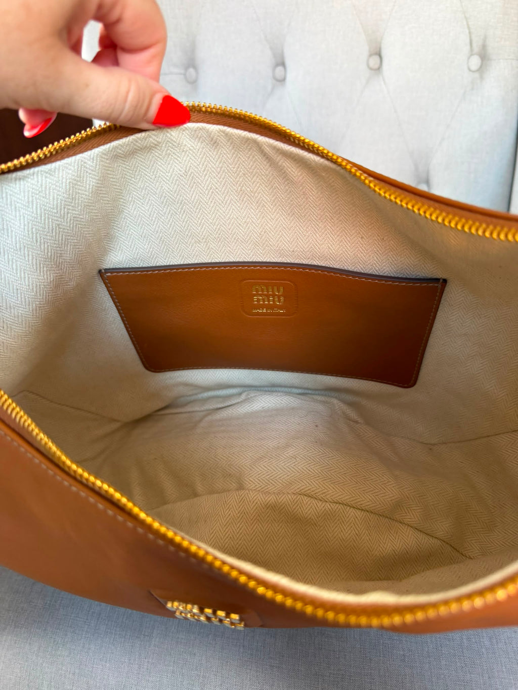 Miu Miu
Logo Plaque Shoulder Bag