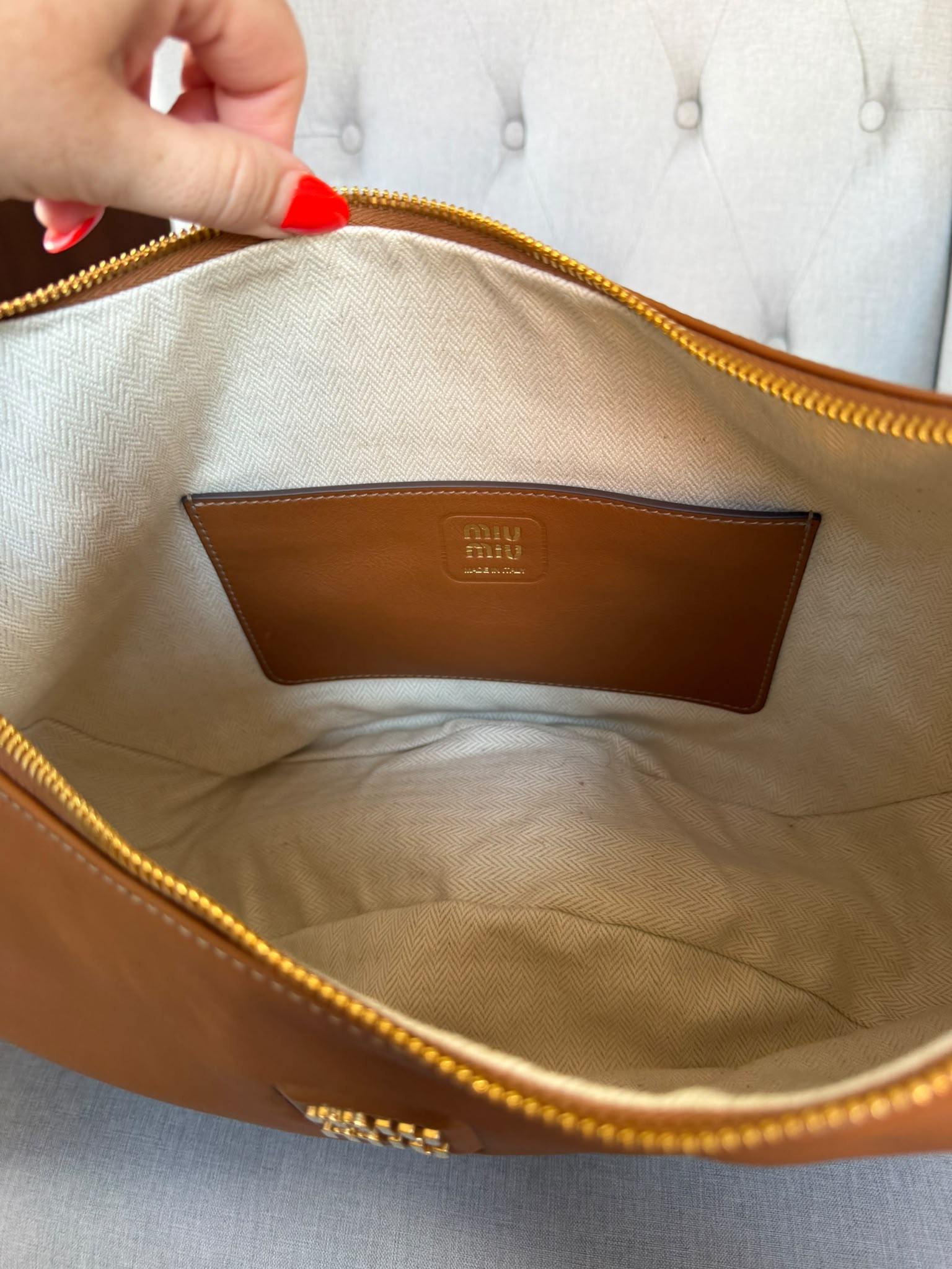Miu Miu
Logo Plaque Shoulder Bag