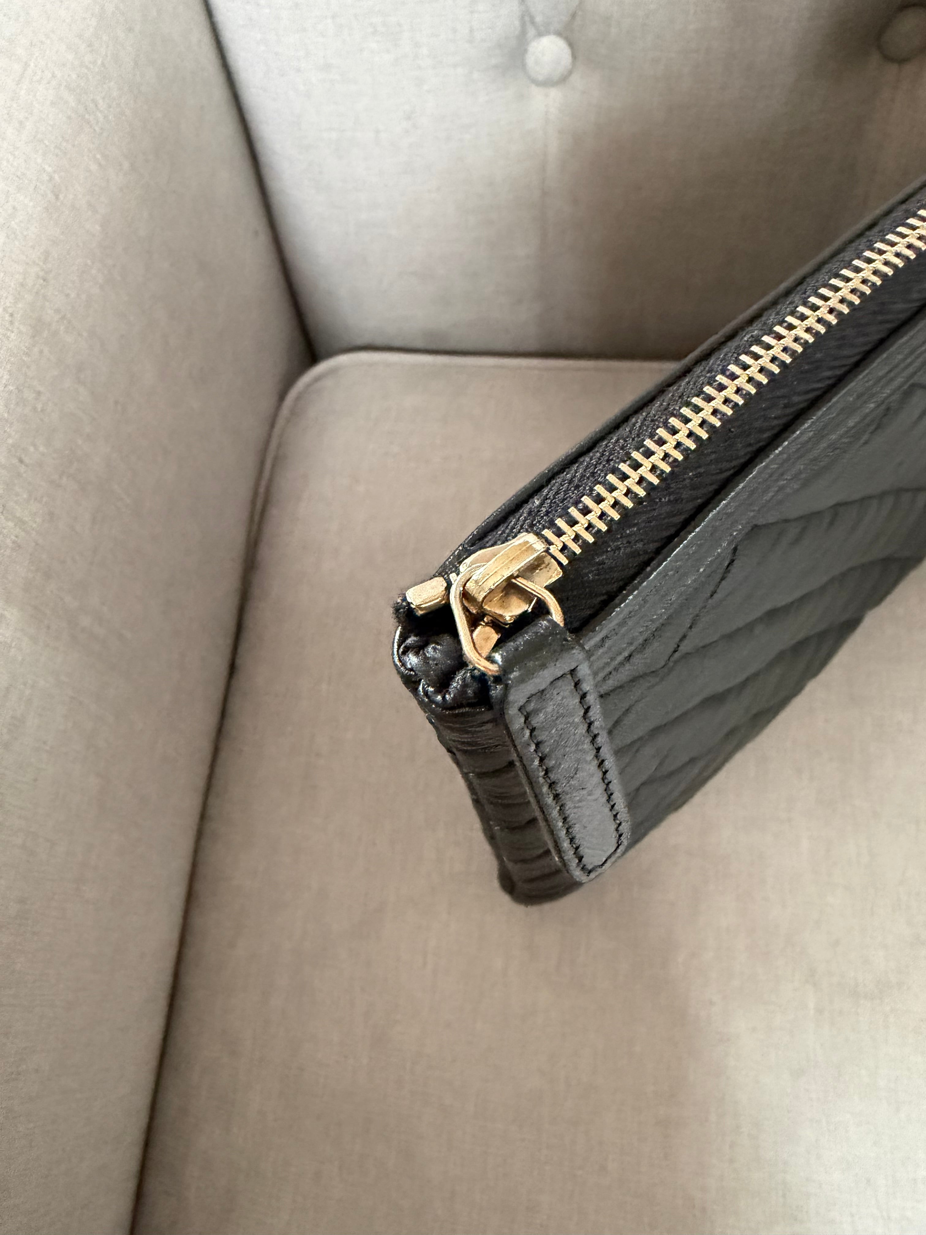 Authentic pre owned Chanel boy pouch clutch bag