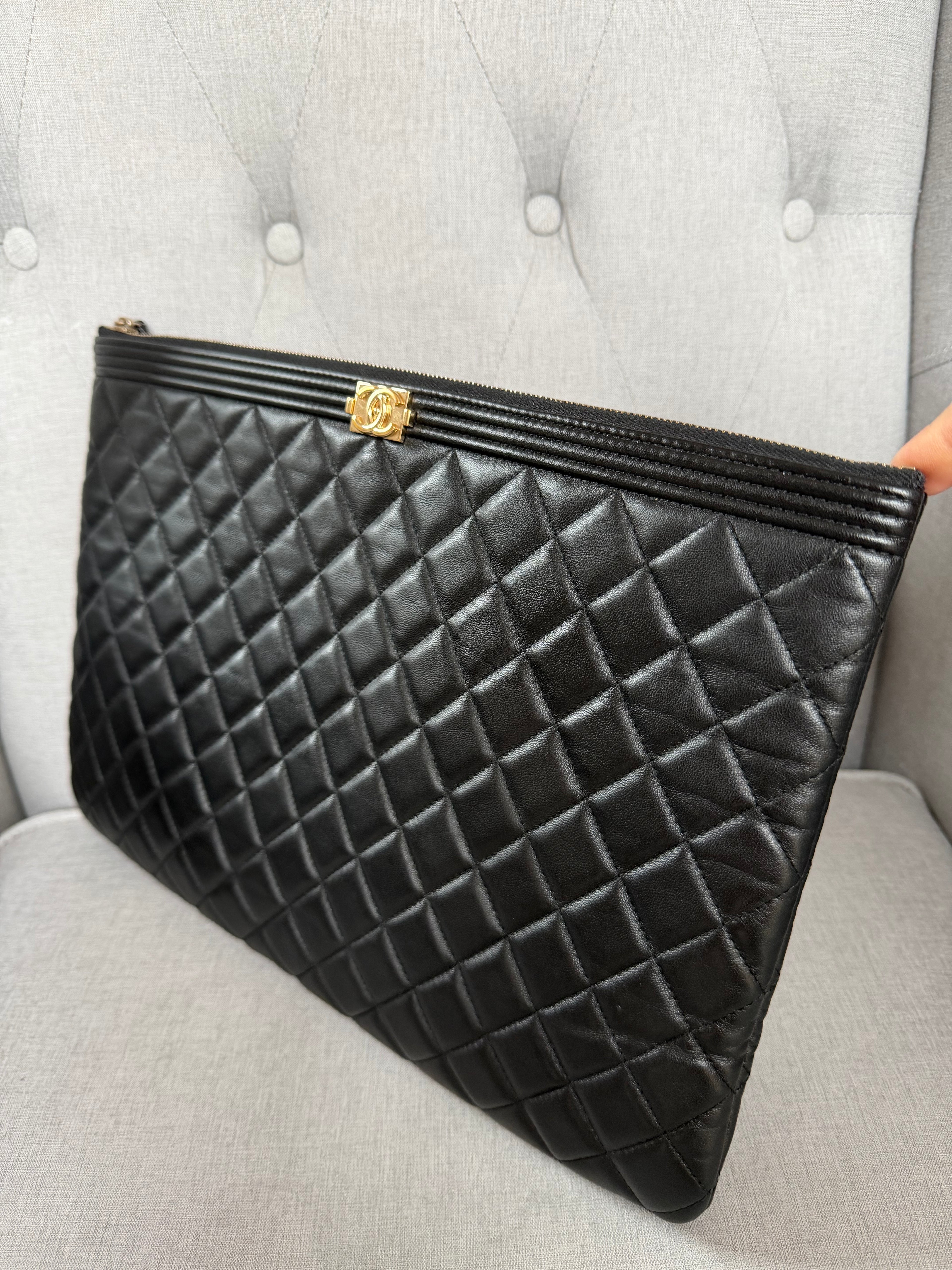 Authentic pre owned Chanel boy pouch clutch bag