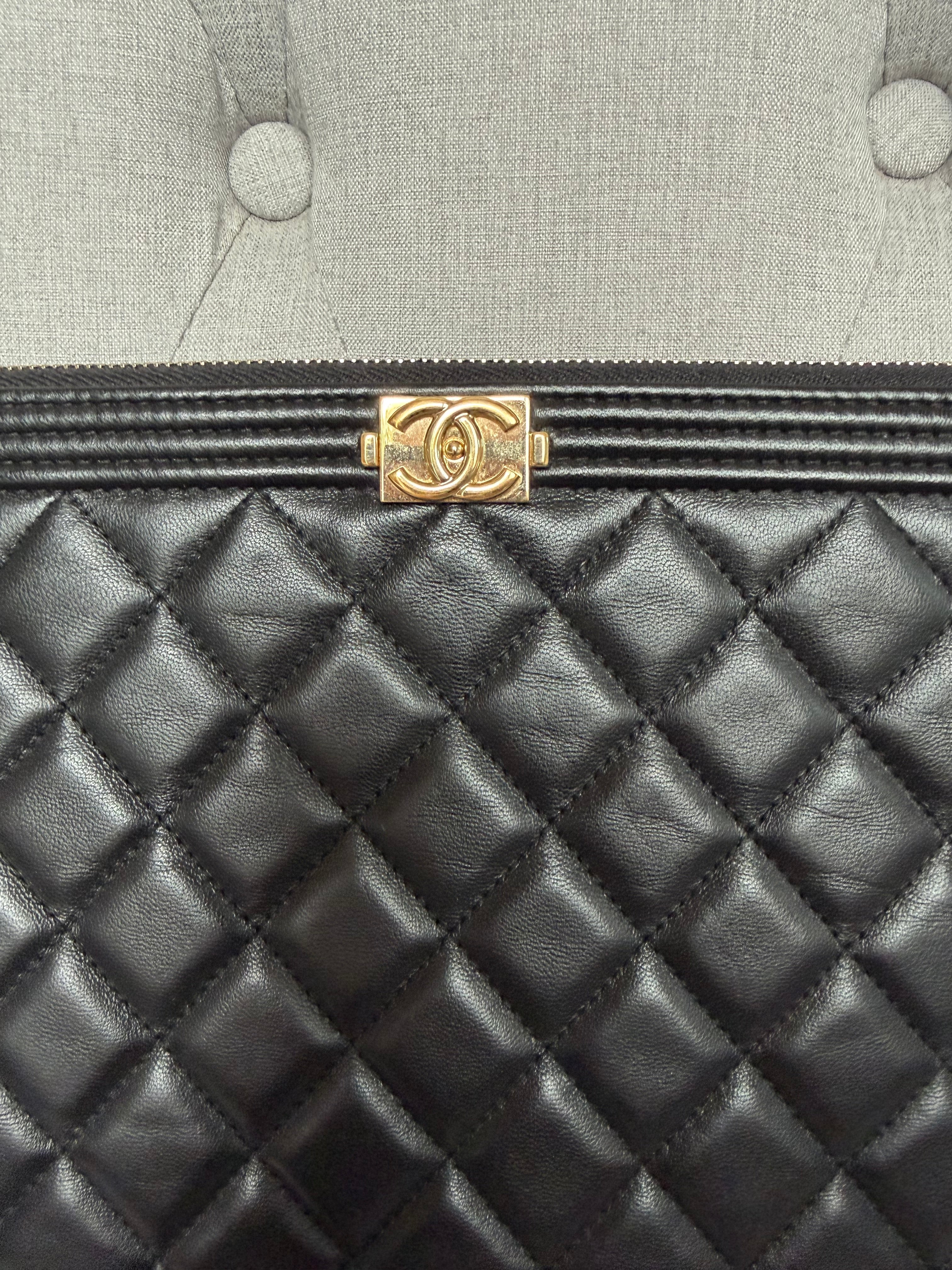Authentic pre owned Chanel boy pouch clutch bag
