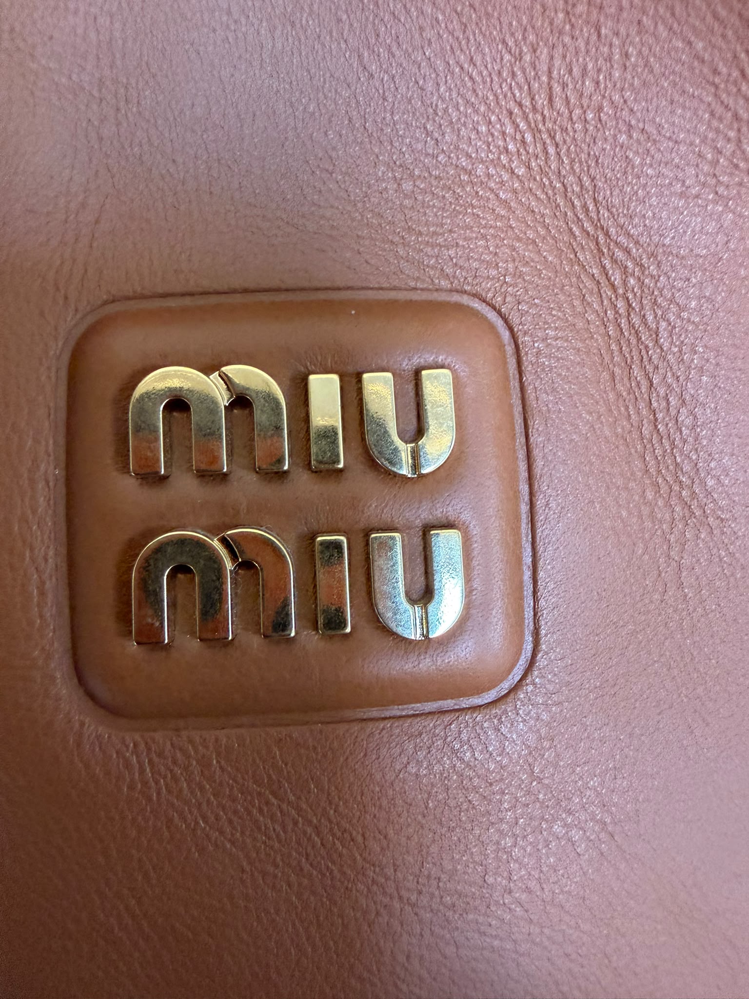 Miu Miu
Logo Plaque Shoulder Bag
