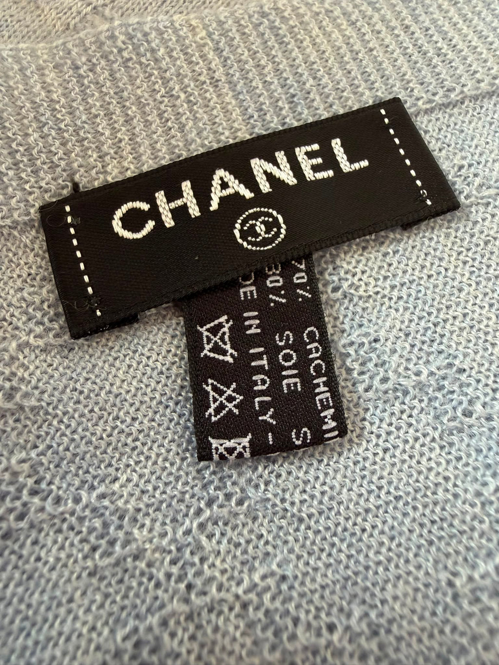 Authentic pre owned Chanel light blue scarf with pink CC logo