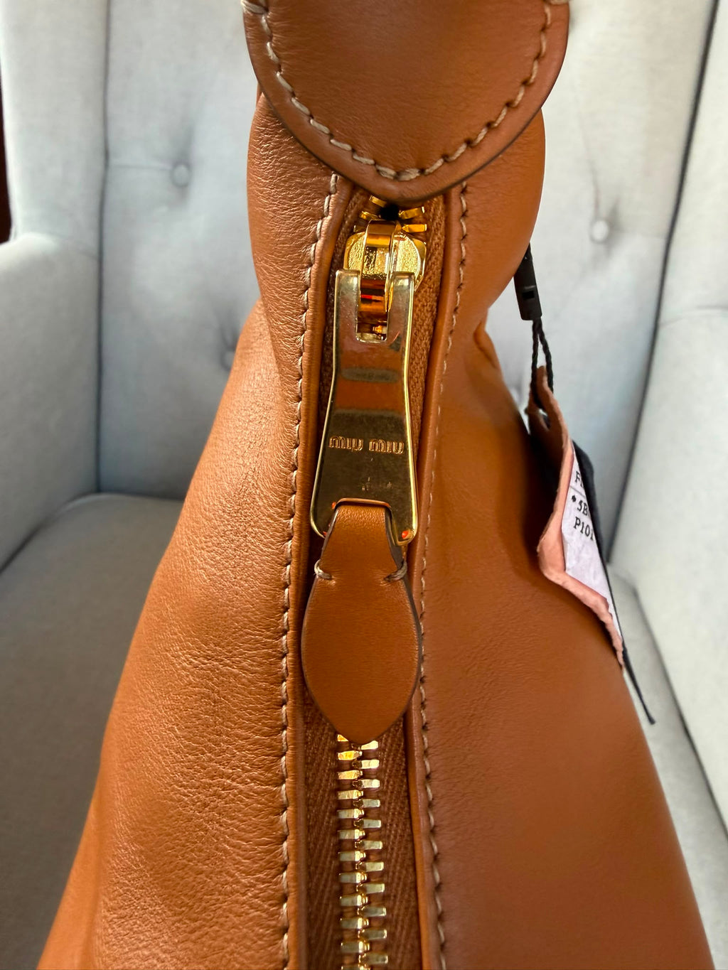 Miu Miu
Logo Plaque Shoulder Bag