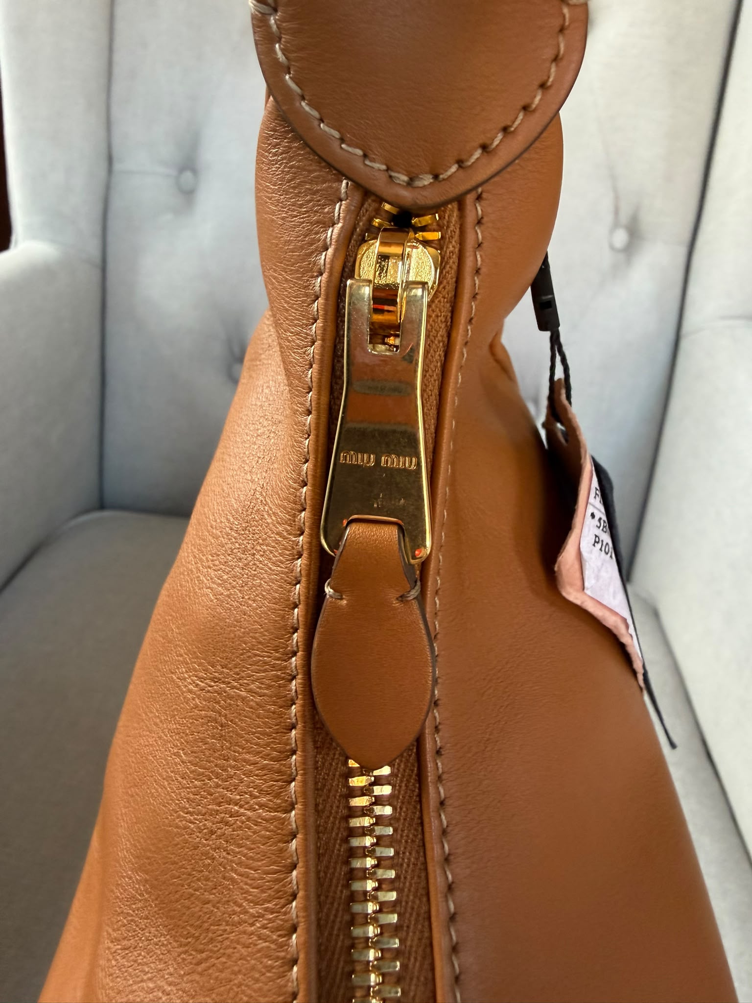 Miu Miu
Logo Plaque Shoulder Bag