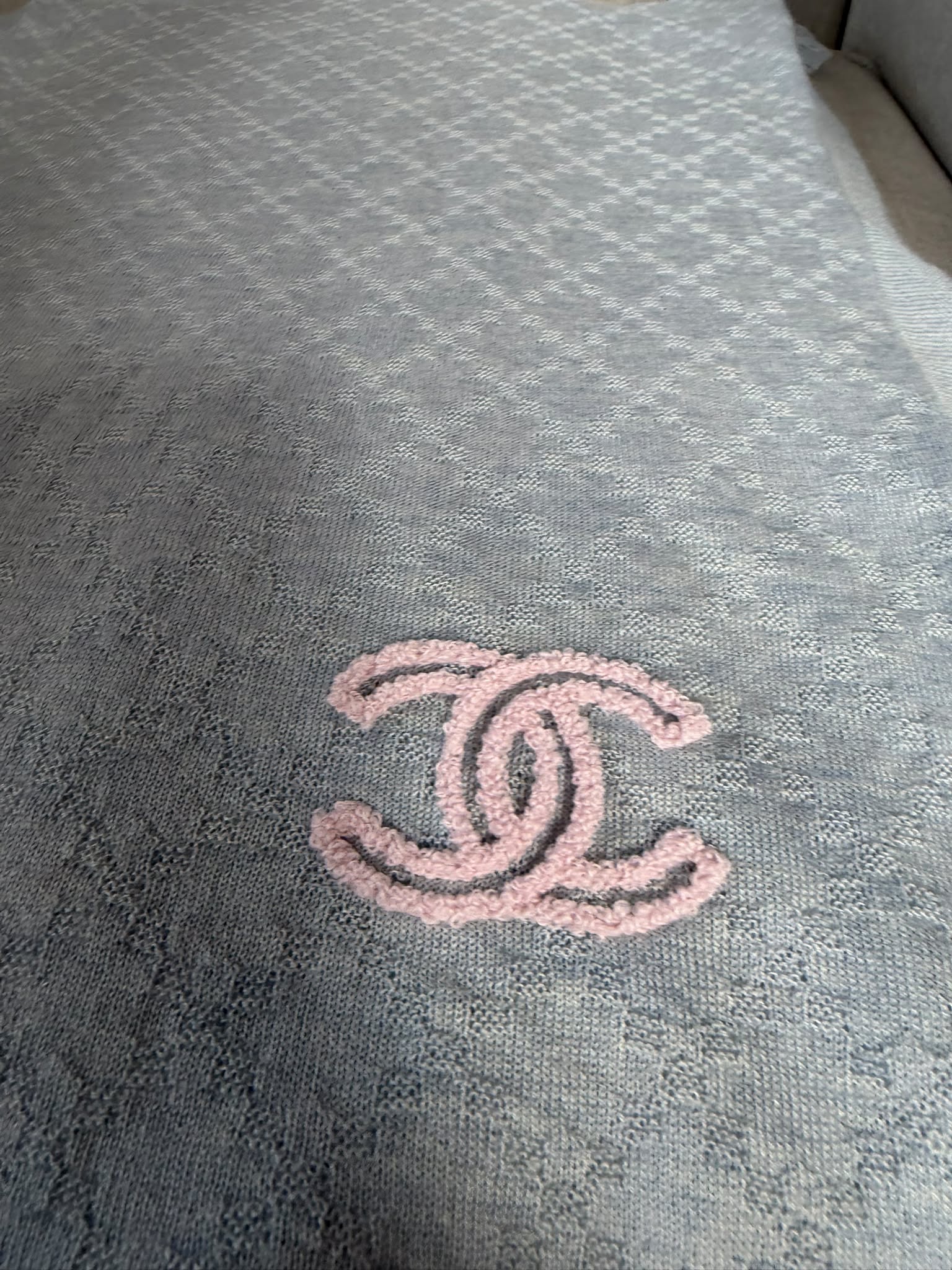 Authentic pre owned Chanel light blue scarf with pink CC logo