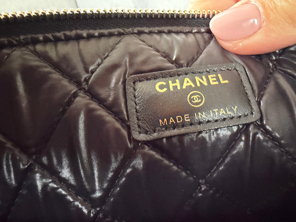 Authentic pre owned Chanel boy pouch clutch bag