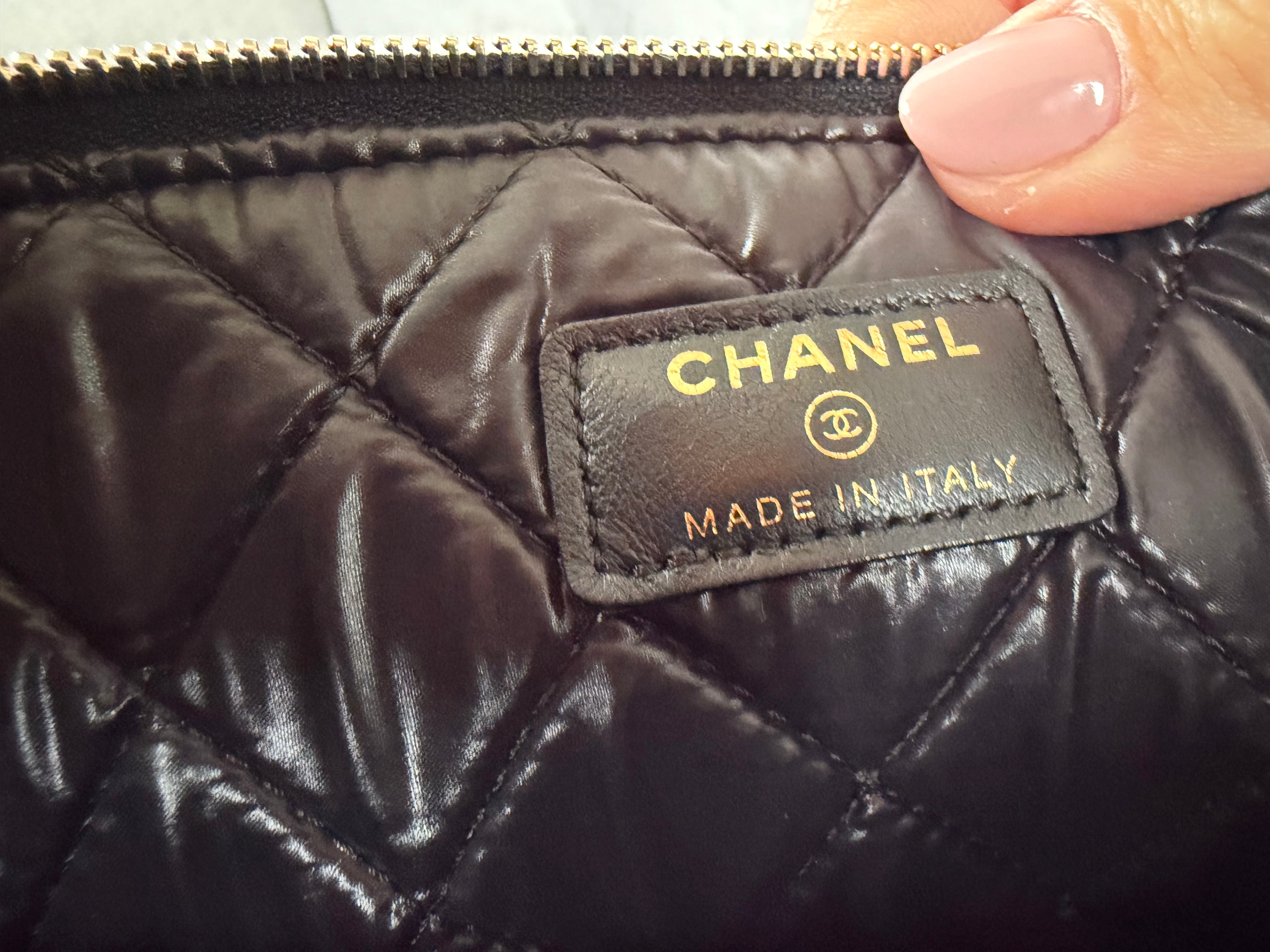 Authentic pre owned Chanel boy pouch clutch bag