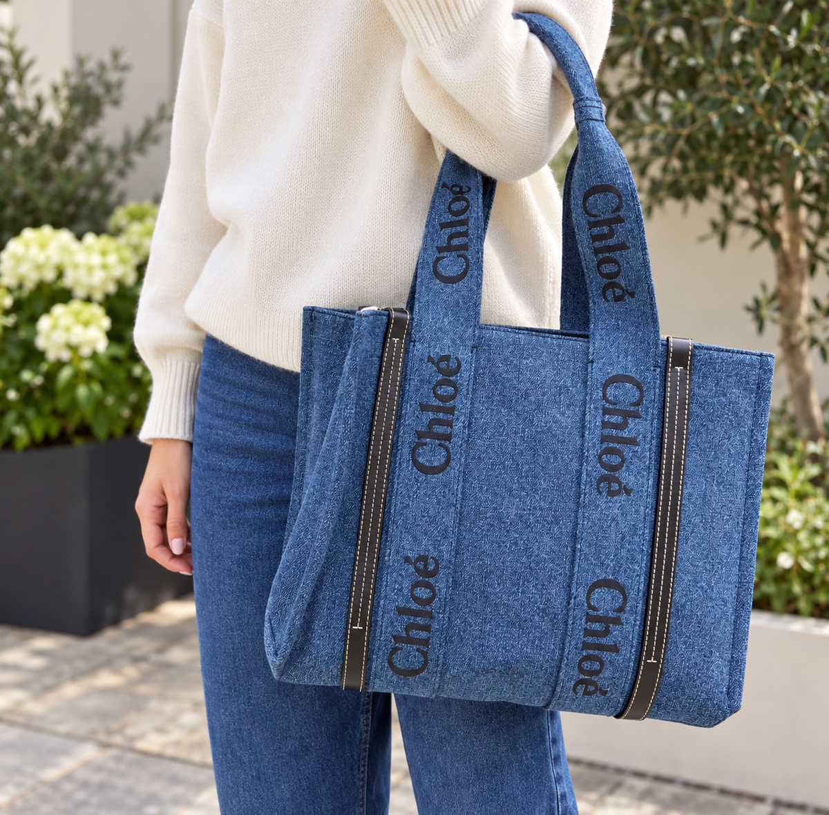 Chloe woody denim tote bag on a model