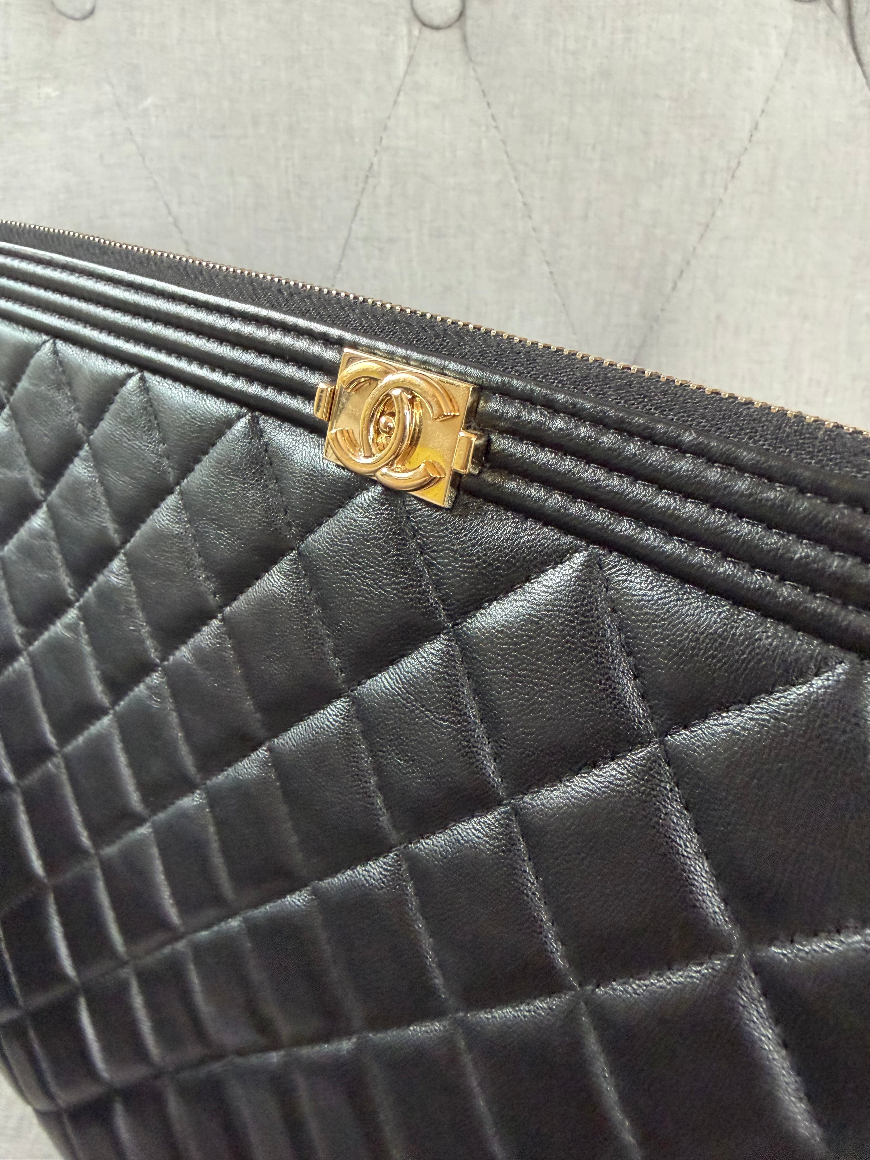 Authentic pre owned Chanel boy pouch clutch bag