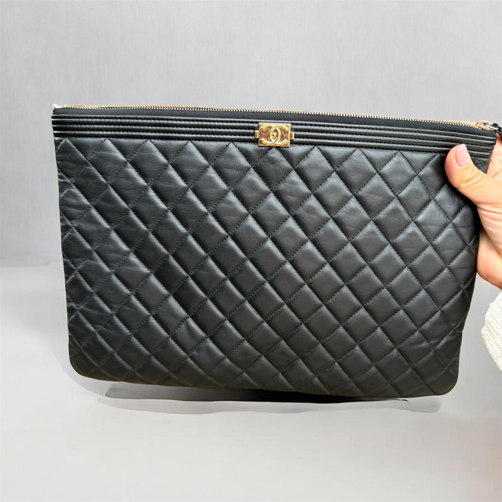 Authentic pre owned Chanel boy pouch clutch bag