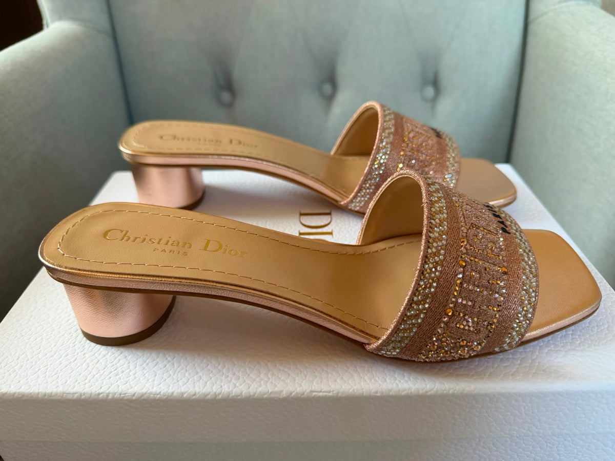 Christian Dior rose gold low block heel mule sandals side profile.