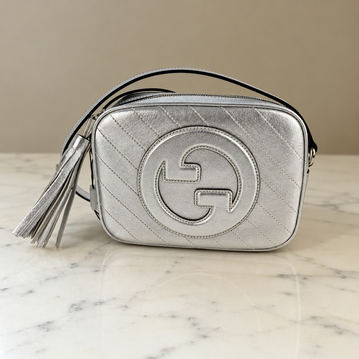     Silver Gucci Blondie bag with original burgundy box, dust bag and paperwork.