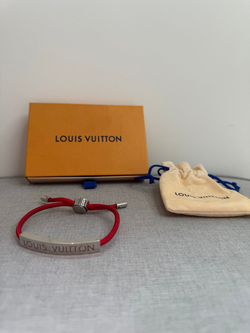 Pre-Owned Louis Vuitton Red Nylon Unisec Bracelet with Stainless Steel logo