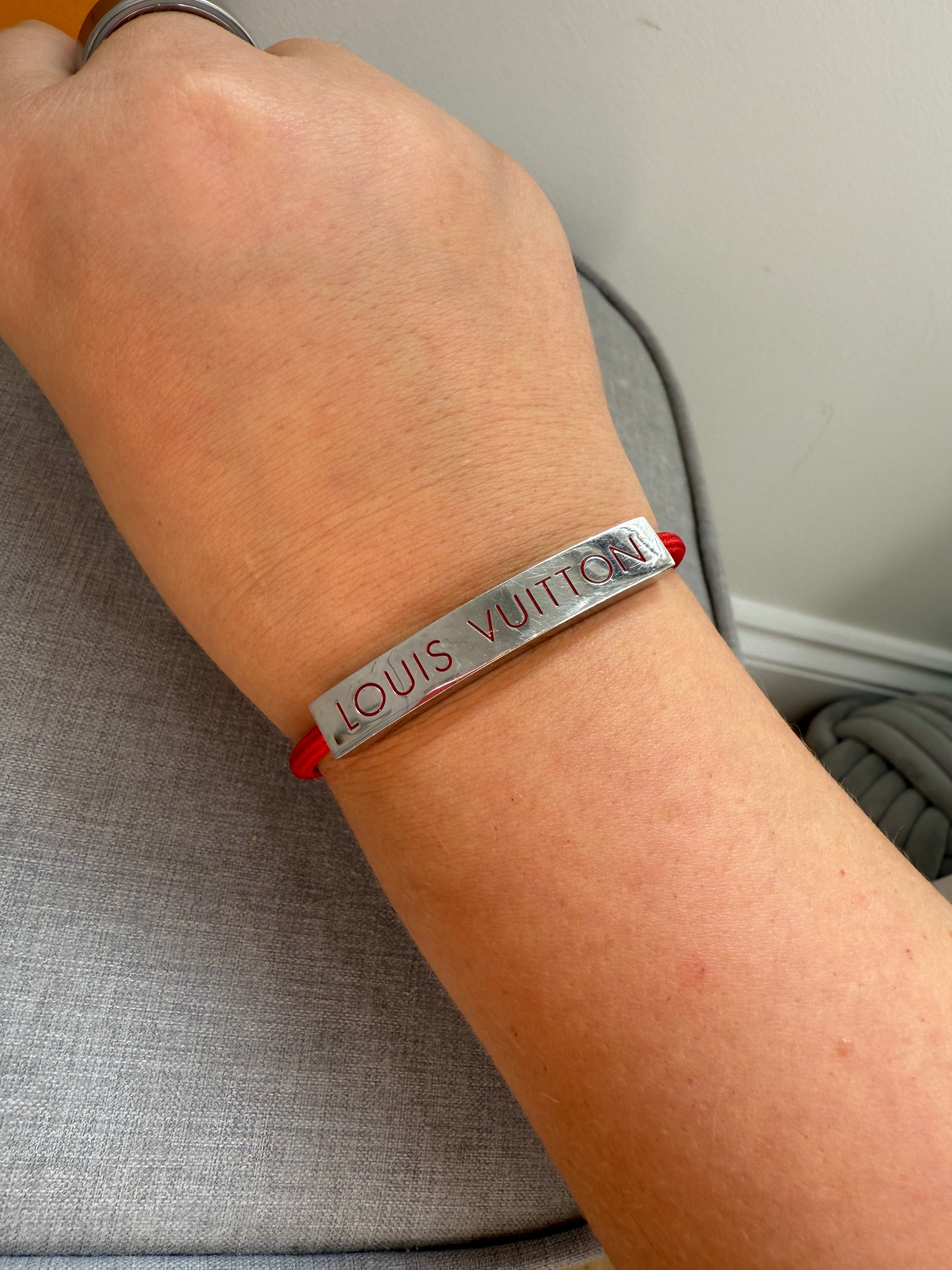 Pre-Owned Louis Vuitton Red Nylon Unisec Bracelet with Stainless Steel logo
