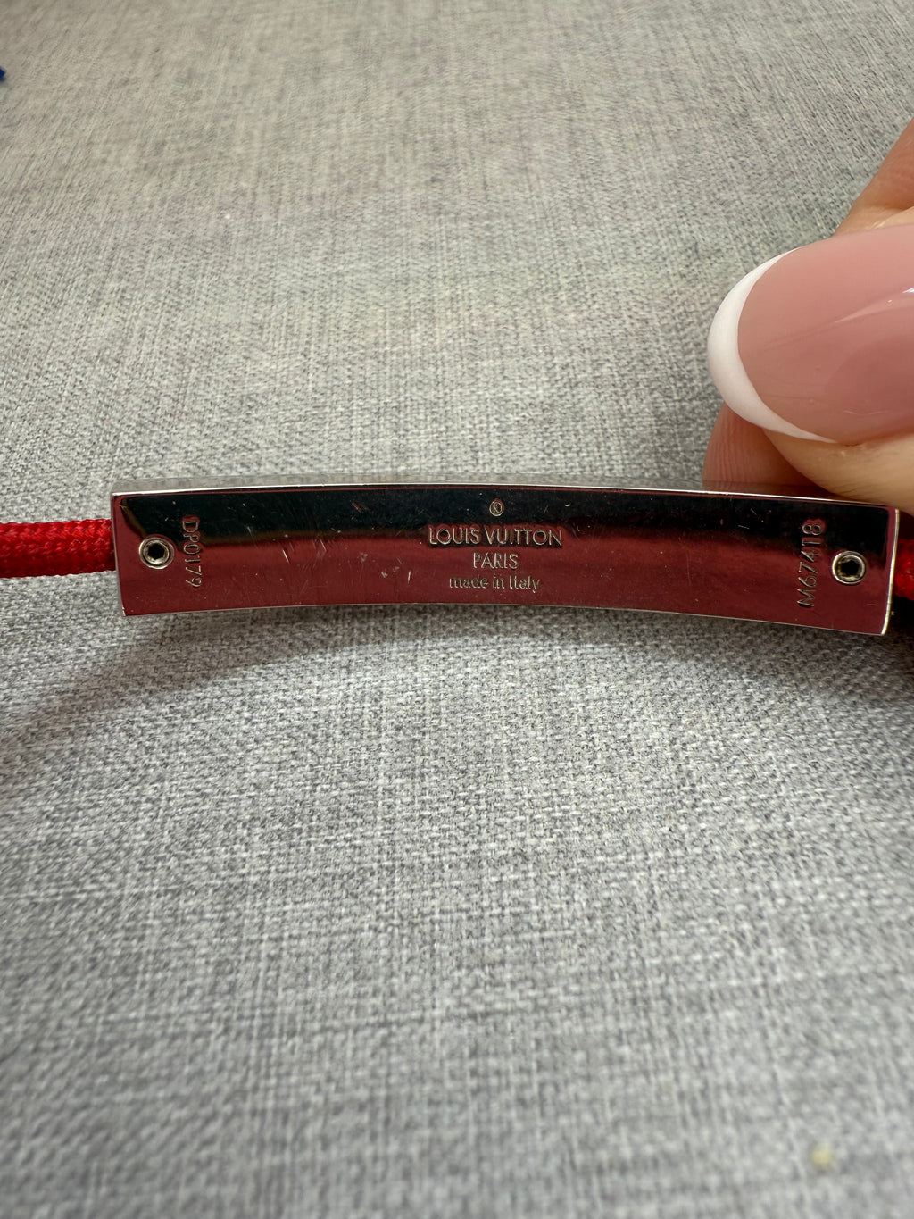 Pre-Owned Louis Vuitton Red Nylon Unisec Bracelet with Stainless Steel logo