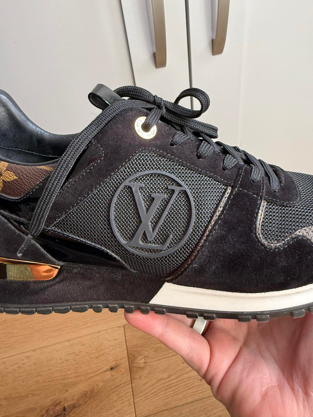 Louis Vuitton runaway trainers logo close up 
