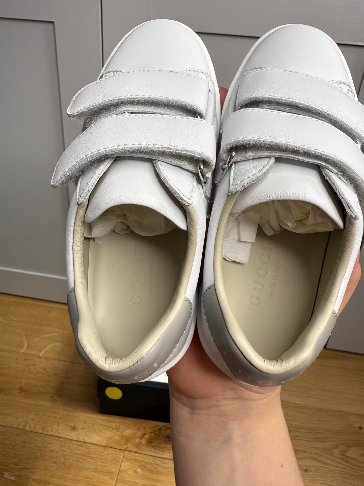 New Gucci GG Ace Junior Leather trainers with perforated GG and grey heel detail
