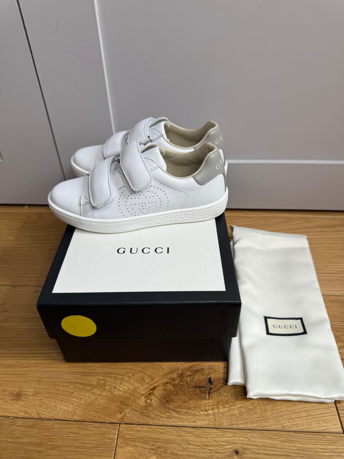New Gucci GG Ace Junior Leather trainers with perforated GG and grey heel detail