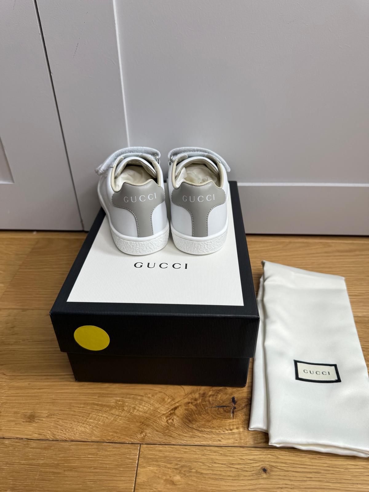 New Gucci GG Ace Junior Leather trainers with perforated GG and grey heel detail