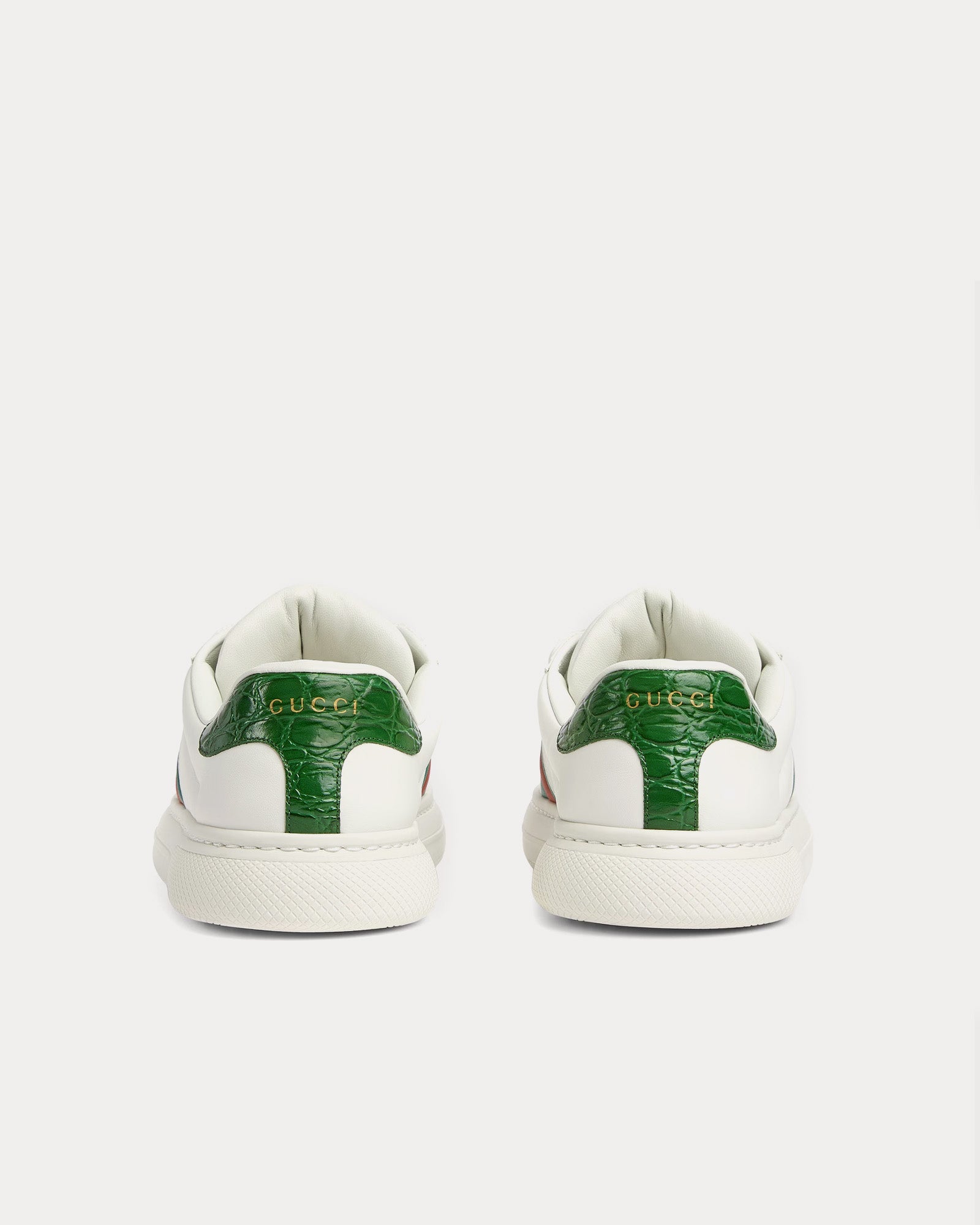 Side view of Gucci Ace women’s white leather trainers with green and red web stripe size EU 38