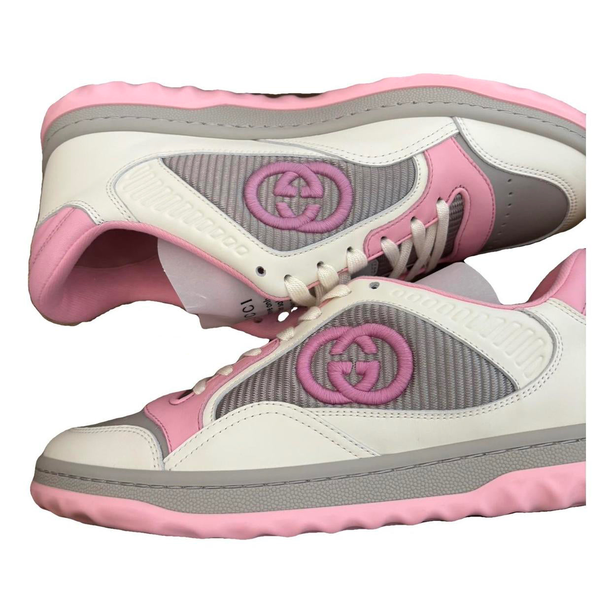 Side view of Gucci MAC80 Dali trainers in off white with soft pink detailing