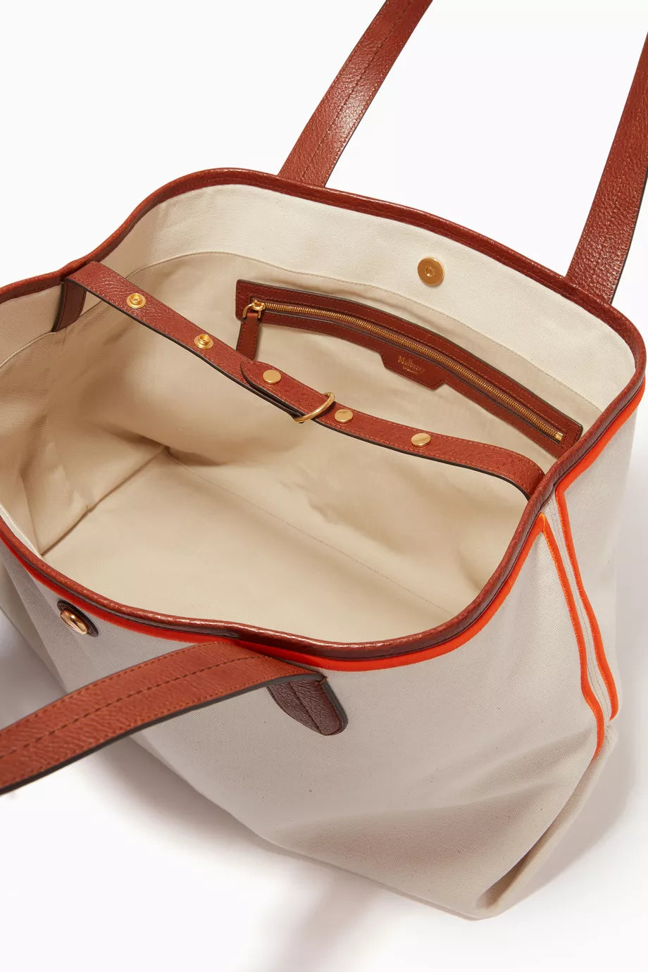 Side profile of Mulberry canvas tote with leather trim