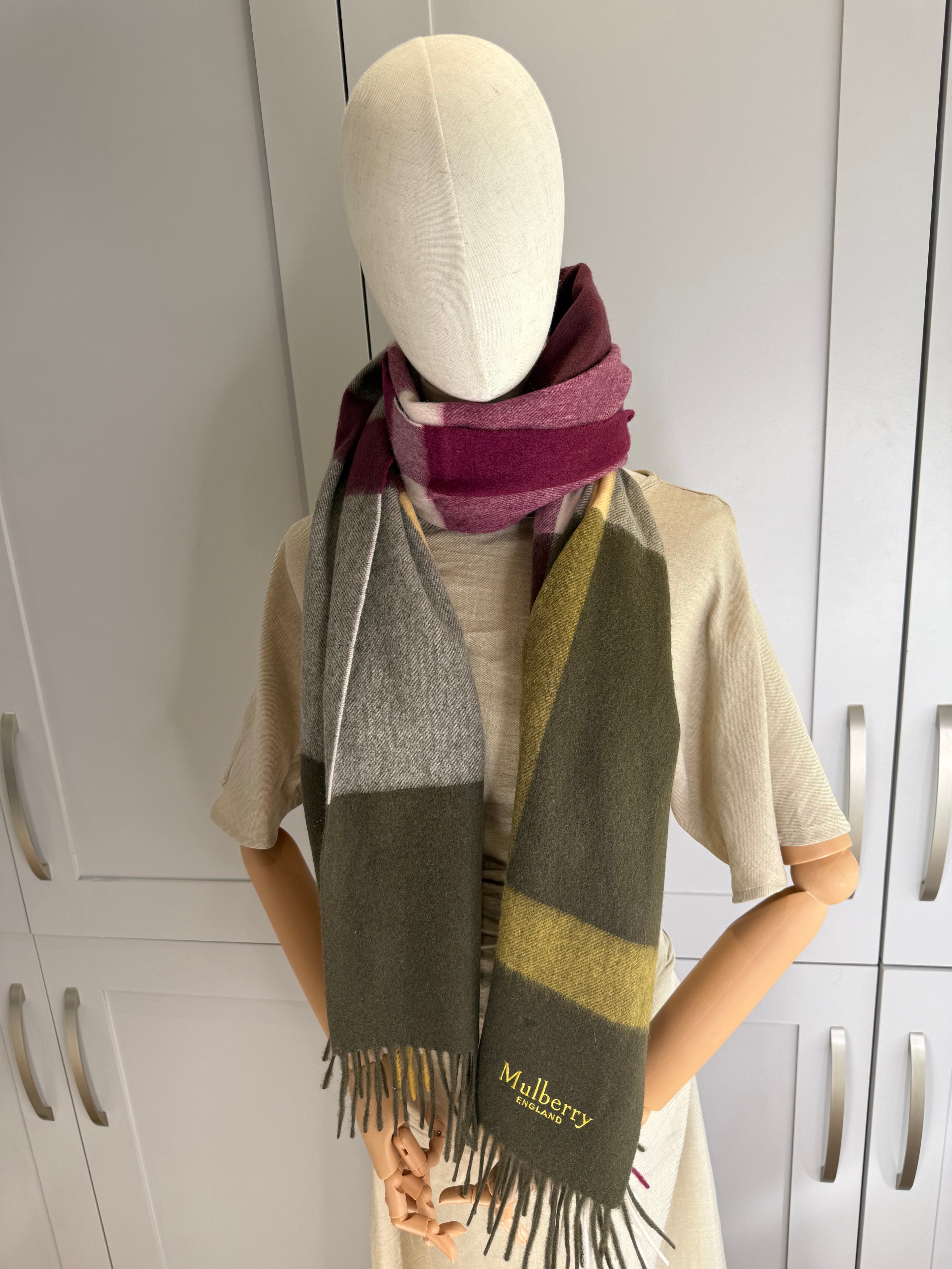 Detail view of Mulberry khaki and berry large check lambswool scarf