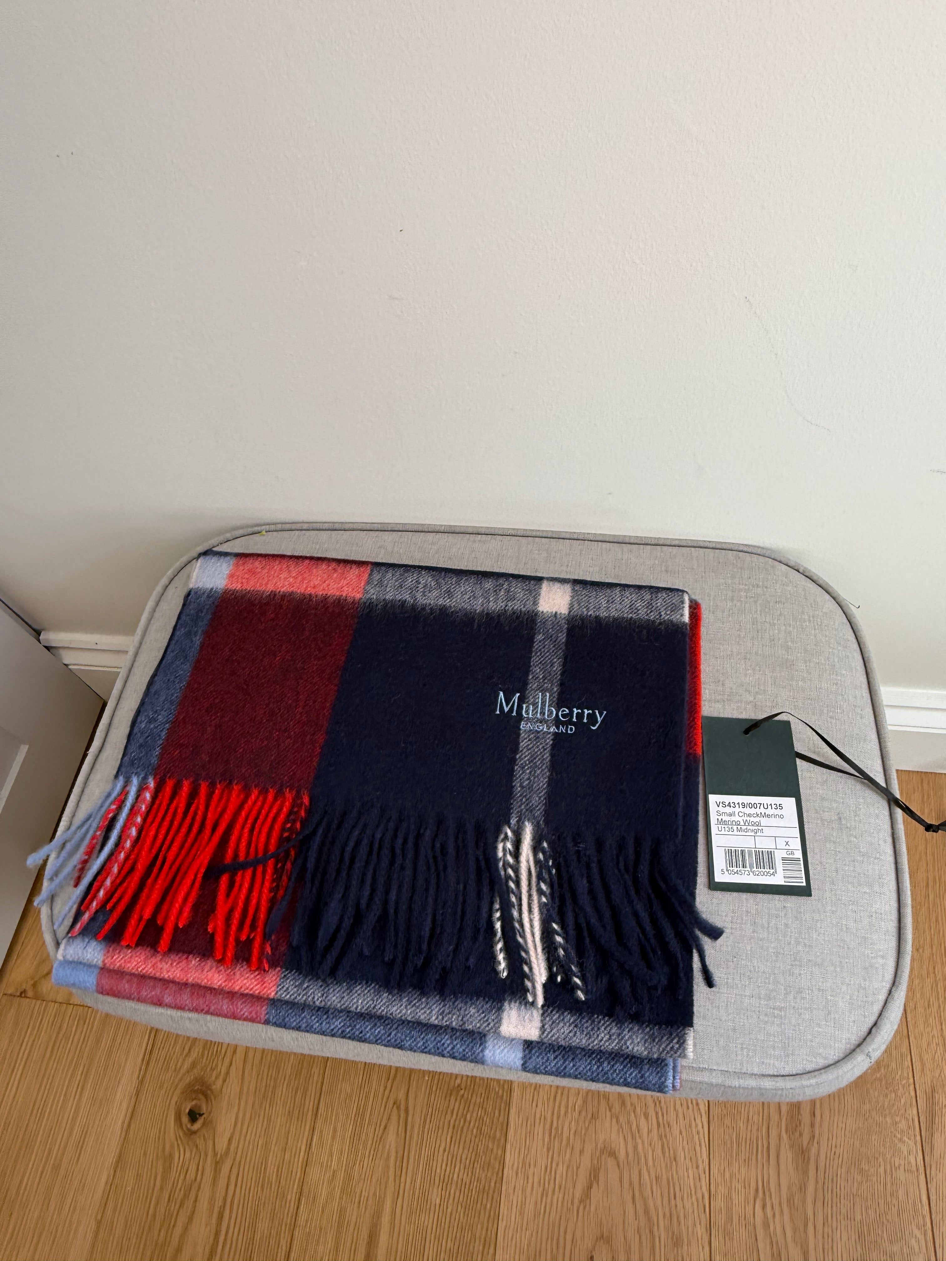 Close up of merino wool weave on Mulberry midnight blue check scarf