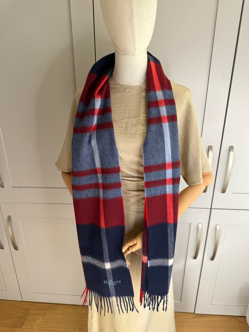 Close up of merino wool weave on Mulberry midnight blue check scarf