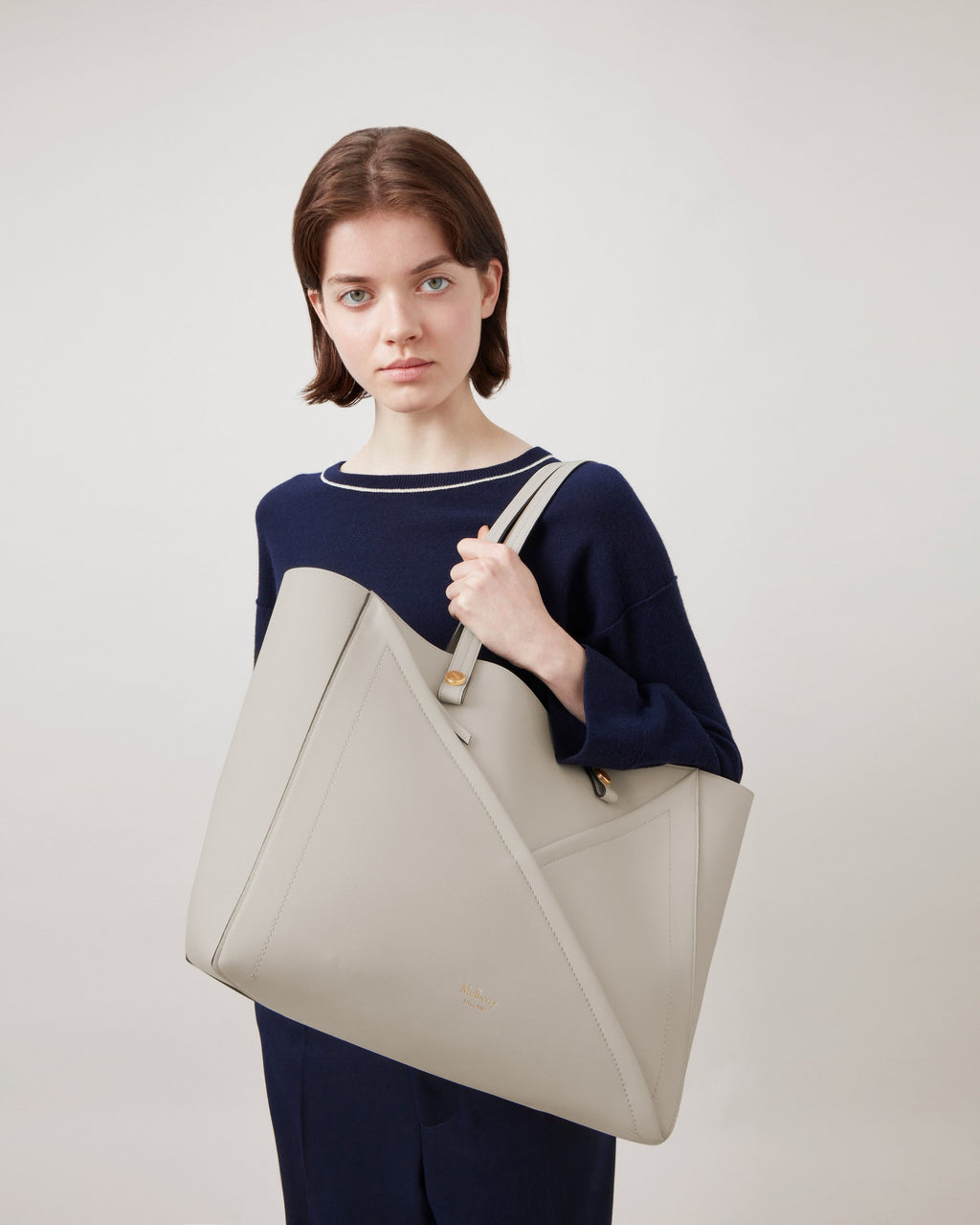 Front view of Mulberry M Zipped Tote bag in chalk with soft gold hardware
