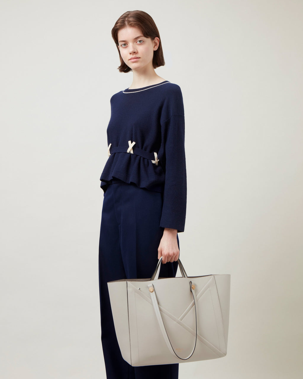 Side profile of Mulberry M Zipped Tote bag in chalk silky calf leather