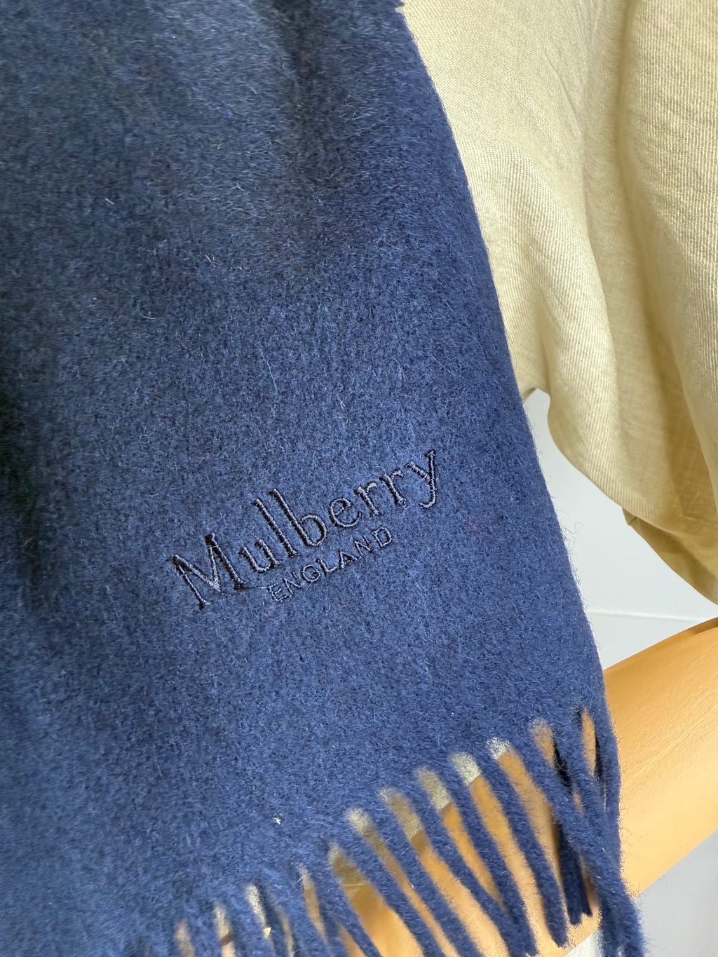 Mulberry logo detail on navy blue merino wool scarf
