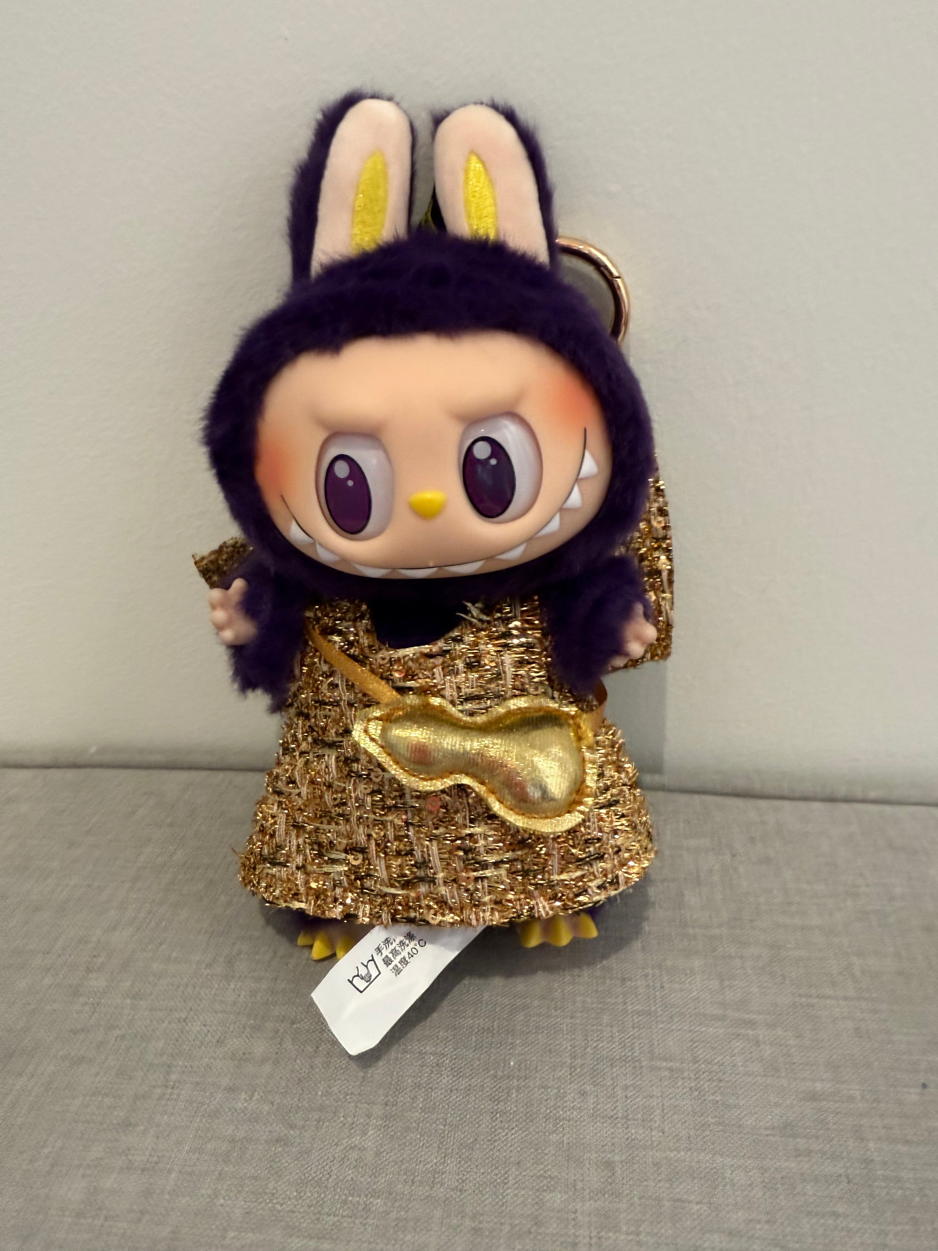 Side view of Pop Mart Wings of Fortune Labubu figure in packaging